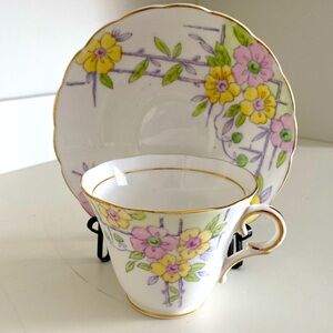 VTG COLCLOUGH BONE CHINA TEACUP AND SAUCER WITH A TRELLIS AND FLORAL DESIGN